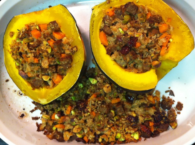 Acorn squash stuffed with a pistachio, cranberry, and faux sausage stuffing
