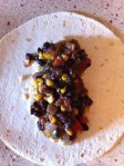 Tortilla, brown rice, beans and veggies, burrito